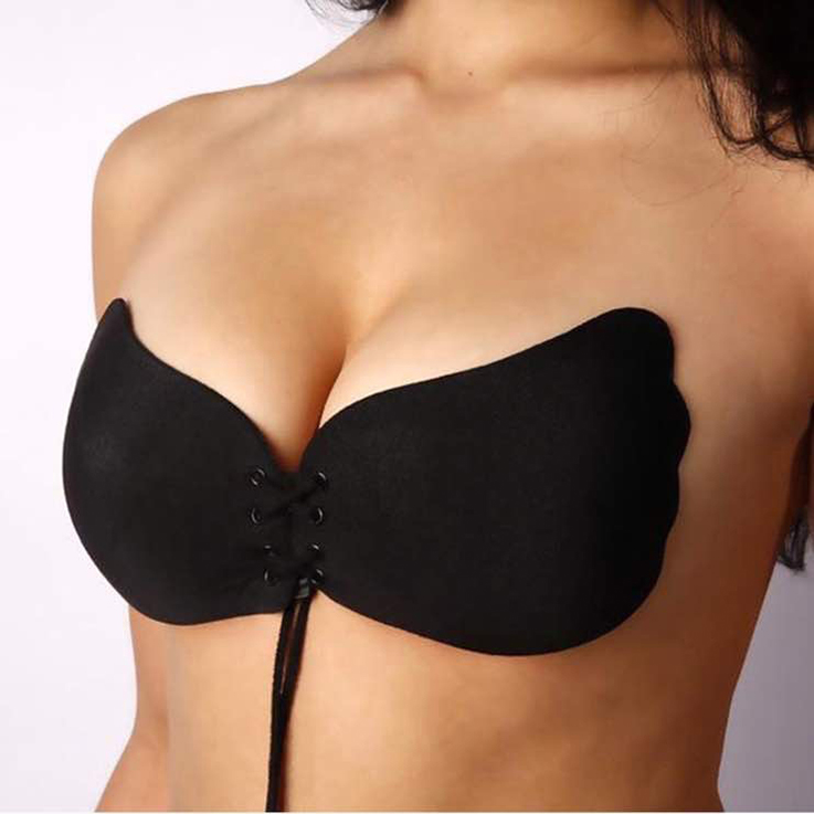 Black strapless adhesive bra with scalloped edges and centre drawstring